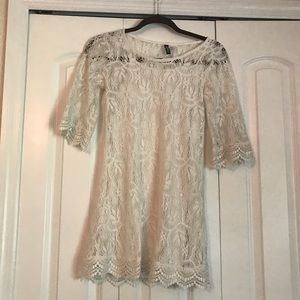 Lace 3/4 sleeve mini dress.